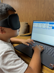 camper practicing keyboarding skills