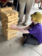 camper playing Jenga